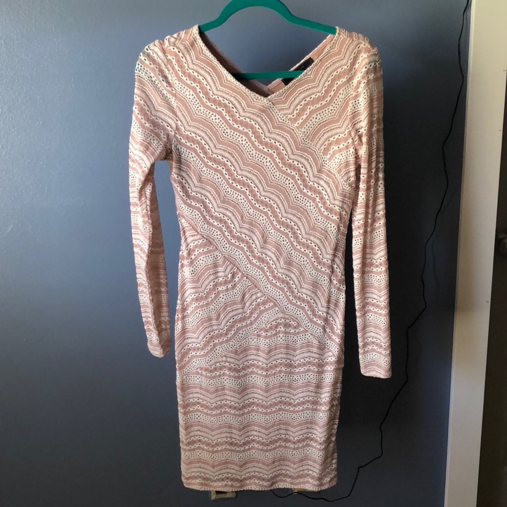 Slim fitting dress.